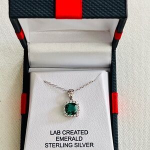 Sterling silver and emerald pendant